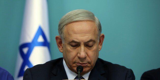 Israeli Prime Minister Benjamin Netanyahu looks on during a press conference on October 8, 2015, at his office in Jerusalem. Netanyahu said Israel was facing a 'wave of terror' that was mostly unorganised, pledging action against those inciting violence, but warning there was no 'magic solution.' AFP PHOTO / GALI TIBBON (Photo credit should read GALI TIBBON/AFP/Getty Images)