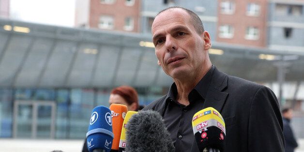 FRANKFURT AM MAIN, GERMANY - FEBRUARY 04: Greek Finance Minister Yanis Varoufakis speaks to journalists after a meeting with the President of the European Central Bank Mario Draghi, on February 4, 2015 in Frankfurt am Main, Germany. Varoufakis has travelled to Germany to re-negotiate the terms of Greece's debt. The finance minister has described the meeting with the European Central Bank as 'fruitful' as he prepares to meet with German Finance Minister Wolfgang SchÃ¤uble tomorrow. (Photo by Hannelore Foerster/Getty Images)