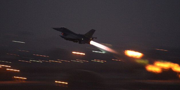 In this image provided by the U.S. Air Force, an F-16 Fighting Falcon takes off from Incirlik Air Base, Turkey, as the U.S. on Wednesday, Aug. 12, 2015, launched its first airstrikes by Turkey-based F-16 fighter jets against Islamic State targets in Syria, marking a limited escalation of a yearlong air campaign that critics have called excessively cautious. (Krystal Ardrey/U.S. Air Force via AP))