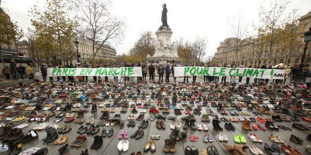 PARIS, FRANCE - NOVEMBER 29: The place de la Republique is covered with shoes as part of symbolic rally organized by the NGO Avaaz during the forbidden COP21 demonstration on November 29, 2015 in Paris, France. The demonstration was banned after the Paris terror attacks on Friday, November 13th. Nevertheless, thousands of people gathered to protest against global warming ahead of COP21conference and an estimated 200 people were arrested after fighting with police. (Photo by Patrick Aventurier/Getty Images)