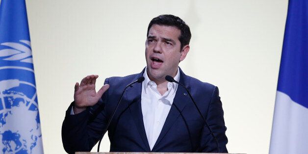 Greece's Prime Minister Alexis Tsipras delivers his statement at the COP21, United Nations Climate Change Conference, in Le Bourget, outside Paris, Monday, Nov. 30, 2015. (AP Photo/Francois Mori)