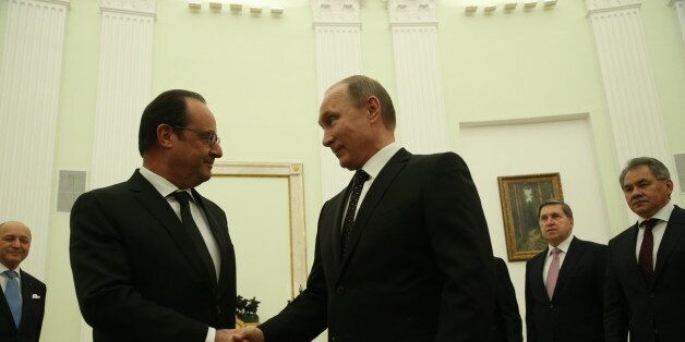 MOSCOW, RUSSIA - NOVEMBER, 26: Russian President Vladimir Putin greets French President Francois Hollande during their meeting in the Kremlin on November 26, 2015 in Moscow, Russia. Hollande is having a one-day trip to Moscow. (Photo by Sasha Mordovets/Getty Images)