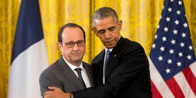 President Barack Obama shakes hands with French President Francois Hollande during their news conference in the East Room of the White House in Washington, Tuesday, Nov. 24, 2015. Hollande's visit to Washington is part of a diplomatic offensive to get the international community to bolster the campaign against the Islamic State militants. (AP Photo/Pablo Martinez Monsivais)