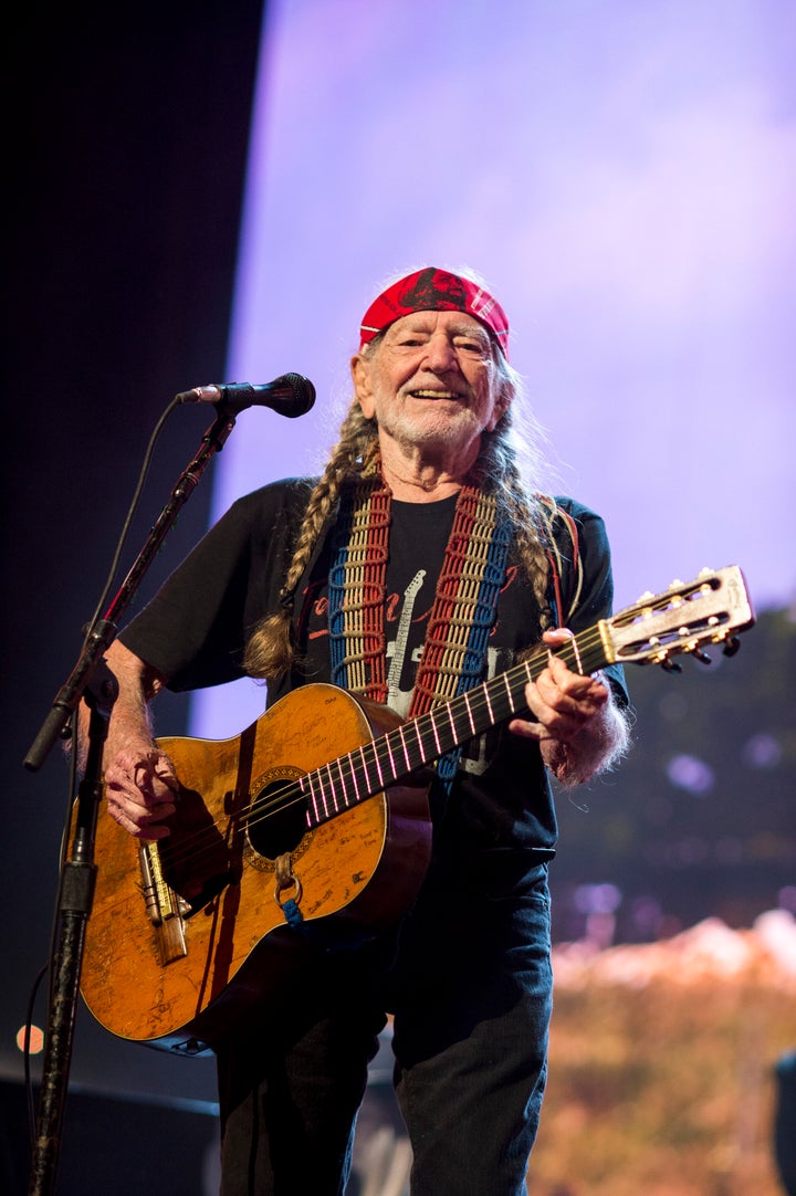 Willie Nelson performs at the 2018 Farm Aid concert in Connecticut. Nelson helped organize the first Farm Aid concert in 1985, and Wisconsin -- a pivotal political state -- hosted the annual event on Saturday, with Nelson again among the performers.