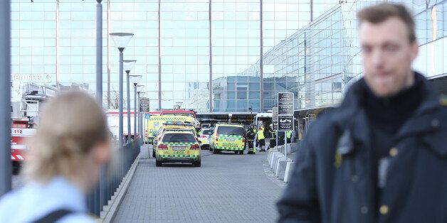 Emergency services vehicles are parked outside the International Airport of Copenhagen which was evacuated due to a bomb alert on Wednesday, Nov. 18. 2015. No bomb was found. (Lasse Kofod/AP via POLFOTO) DENMARK OUT