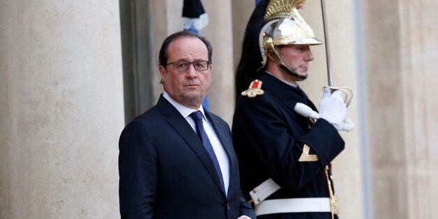 French President Francois Hollande waits for the arrival of US Secretary of State John Kerry at the Elysee Palace, in Paris, France, Tuesday, Nov. 17, 2015. Kerry arrived in Paris to pay tribute to last Friday November 13 attacks in France. (AP Photo/Francois Mori)