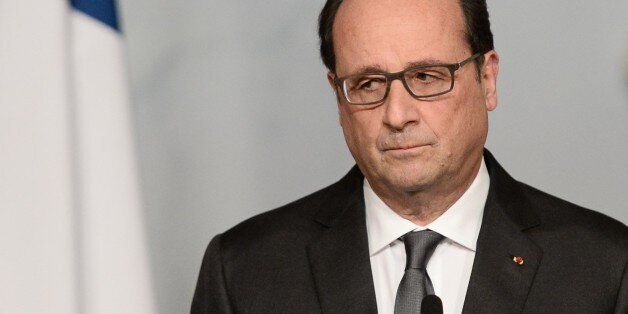 French president Francois Hollande speaks at the Elysee palace in Paris on November 14, 2015, following a series of coordinated attacks in and around Paris late Friday which left more than 120 people dead. Hollande on Saturday blamed the Islamic State group for the attacks in Paris that left at least 128 dead, calling them an 'act of war'. AFP PHOTO / POOL / STEPHANE DE SAKUTIN (Photo credit should read STEPHANE DE SAKUTIN/AFP/Getty Images)