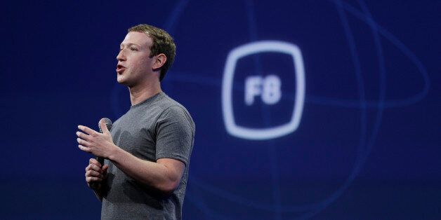 FILE - In this March 25, 2015, file photo, CEO Mark Zuckerberg gestures while delivering the keynote address at the Facebook F8 Developer Conference in San Francisco. Zuckerberg said Tuesday, Sept. 15, Facebook may finally be getting a button that lets you quickly express something beyond a