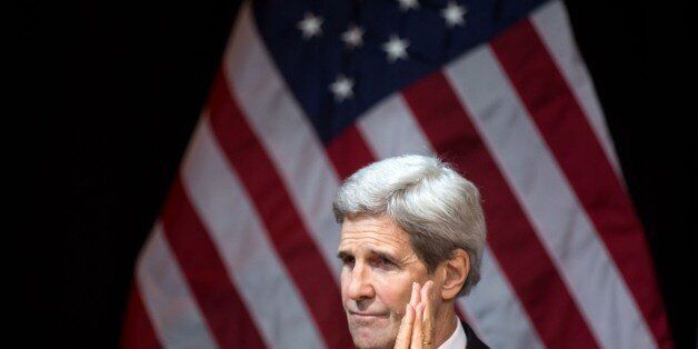 US Secretary of State John Kerry attends a press conferene after discussions on Syria in Vienna, Austria, on November 14, 2015. AFP PHOTO / VLADIMIR SIMICEK (Photo credit should read VLADIMIR SIMICEK/AFP/Getty Images)