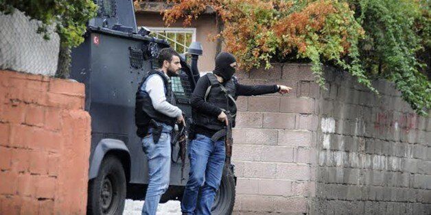Turkish special police forces are pictured during clashes with IS (Islamic State) fighters on October 26, 2015, in Diyarbakir. Seven suspected Islamic State militants and two Turkish police officers were killed on Monday in a fierce gun battle in the main city in the Kurdish-majority southeast, security sources said. AFP PHOTO / ILYAS AKENGIN (Photo credit should read ILYAS AKENGIN/AFP/Getty Images)