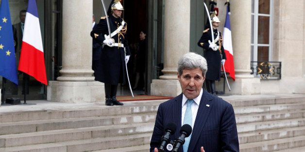 PARIS, FRANCE - NOVEMBER 17: US Secretary of State John Kerry talks to the media after a meeting with French President Francois Hollande at the Elysee Presidential Palace on November 17, 2015 in Paris, France. John Kerry arrives in Paris to pay tribute to victims of last week's terrorist attacks. (Photo by Thierry Chesnot/Getty Images)