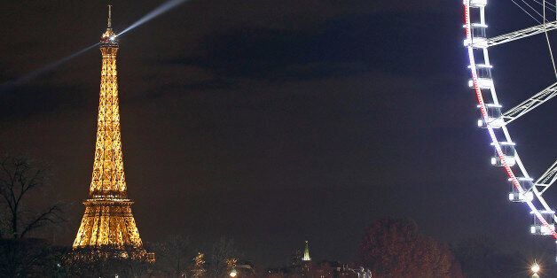PARIS, FRANCE - NOVEMBER 13: A picture shows the Eiffel Tower by night on November 13, 2015 in Paris, France. Paris will host the World Climate Change Conference 2015 (COP21) from November 30 to December 11, 2015. (Photo by Chesnot/Getty Images)