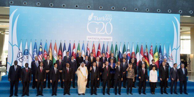 World leaders participate in a family photo during the G20 summit in Antalya, Turkey, November 15, 2015. AFP PHOTO / SAUL LOEB (Photo credit should read SAUL LOEB/AFP/Getty Images)