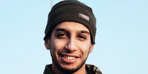 This undated image made available in the Islamic State's English-language magazine Dabiq, shows Belgian Abdelhamid Abaaoud. Abaaoud the Belgian jihadi suspected of masterminding deadly attacks in Paris was killed in a police raid on a suburban apartment building, the city prosecutor's office announced Thursday Nov. 1, 2015. Paris Prosecutor Francois Molins' office said 27-year-old Abdelhamid Abaaoud was identified based on skin samples. His body was found in the apartment building targeted in the chaotic and bloody raid in the Paris suburb of Saint-Denis on Wednesday. (Militant photo via AP)