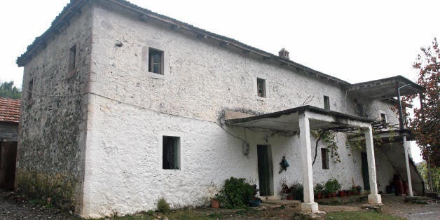 TO GO WITH AFP STORY 'Warcrimes-Albania-Serbia-Kosovo' This picture taken on October 30, 2008 shows the house of Albanian Mersin Katuci, 50, in the central Albanian village of Rripe, some 115 km (72 miles) from Tirana. The home was thoroughly searched by UN prosecutors looking for evidence after it was alleged that Serbs prisoners had their organs extracted there and sold by the ethnic Albanian Kosovo Liberation Army. The allegations that Kosovo Albanians trafficked Serb prisoners through Albania from Kosovo for their body organs were raised earlier this year by former UN chief war crimes prosecutor Carla Del Ponte. AFP PHOTO/ GENT SHKULLAKU (Photo credit should read GENT SHKULLAKU/AFP/Getty Images)