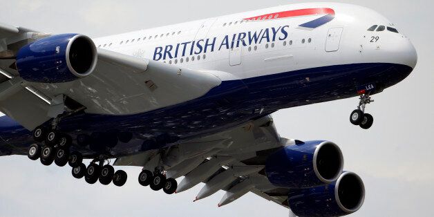 A British Airways Airbus A380 performs its demonstration flight during the 50th Paris Air Show at Le Bourget airport, north of Paris, Wednesday, June 19, 2013. (AP Photo/Francois Mori)