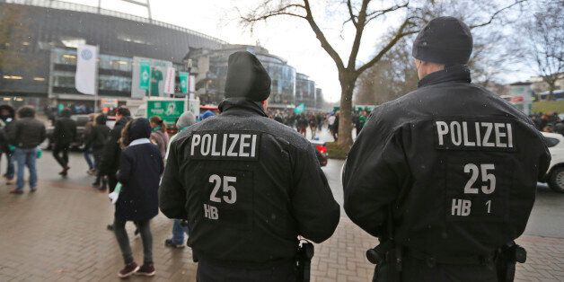 Special police forces secure the football stadium for the German Bundesliga soccer match Werder Bremen versus VfL Wolfsburg in Bremen, Germany, Sunday, March 1, 2015. Bremenâs top security official, Ulrich Maeurer, said Sunday the city was on terror alert this weekend after receiving information that a 39-year-old Lebanese suspect had tried to procure weapons of war. However, Maeurer said, police didnât find any weapons during their searches and the two persons who had been detained temporarily were set free again. Police had stepped up their presence in the city Saturday and increased security for the Jewish community. (AP Photo/Frank Augstein)(AP Photo/Frank Augstein)