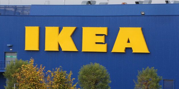 A car is driven past the IKEA store in Plaisir, west of Paris, Wednesday Nov. 20, 2013. Officials say senior executives of IKEA France are in police custody, over allegations that they illegally spied on employees and customers.(AP Photo/Remy de la Mauviniere)