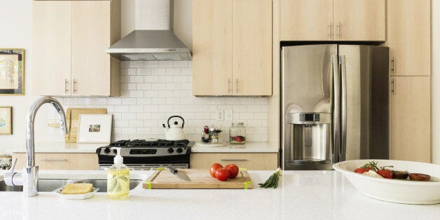 Food and cooking implements on kitchen counter