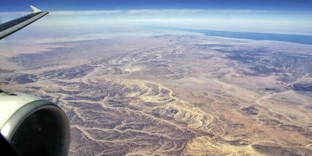 Plane over egyptian Desert on the Way to Hurghada with Gulf of Suez (Red Sea) and Sinai in the Background