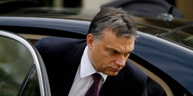 Hungarian Prime Minister Victor Orban arrives at the Presidential palace for a meeting with Cypriot President Dimitris Christofias, unseen, in the divided capital Nicosia, Cyprus, Monday, Dec. 13, 2010. Orban is in Cyprus for one-day official visit. (AP Photo/Petros Karadjias)
