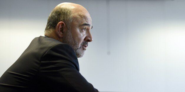 European Union Commissioner for Economic and Financial Affairs, Taxation and Customs Pierre Moscovici talks to journalists on October 29, 2015 at the EU headquarters in Brussels. AFP PHOTO / JOHN THYS (Photo credit should read JOHN THYS/AFP/Getty Images)
