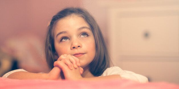 cute, brown haired, little girl, looking up, kneeling by her bed, saying her bedtime prayers. folded hands, sweet, pink