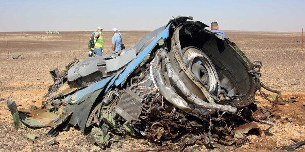 SUEZ, EGYPT - NOVEMBER 01: A plane part is seen as the Egyptian officials inspect the crash site of Russian Airliner in Suez, Egypt on November 01, 2015. A Russian Airbus-321 airliner with 224 people aboard crashed in Egypt's Sinai Peninsula on yesterday. According to Egypts Civil Aviation Authority, the plane had been lost contact with air-traffic controllers shortly after taking off from the Egyptian Red Sea resort city of Sharm el-Sheikh en route to St Petersburg. (Photo by Alaa El Kassas/Anadolu Agency/Getty Images)