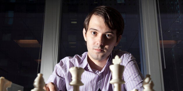 Martin Shkreli, chief investment officer of MSMB Capital Management, sits for a photograph behind a chess board in New York, U.S., on Wednesday, Aug. 10, 2011. MSMB made an unsolicited $378 million takeover bid for Amag Pharmaceuticals Inc. and said it will fire the drugmaker's top management if successful. Photographer: Paul Taggart/Bloomberg via Getty Images ***Local Caption ** Martin Shkreli