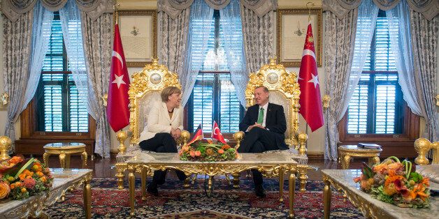 ISTANBUL, TURKEY - OCTOBER 18: In this handout photo provided by the German Government Press Office (BPA), German Chancellor Angela Merkel and Turkish President Recep Tayyip Erdogan talk at the start of their meeting at the Yildiz Palace on October 18, 2015 in Istanbul, Turkey. Merkel also met Turkish Prime Minister Ahmet Davutoglu earlier today. (Photo by Guido Bergmann/Bundesregierung via Getty Images)