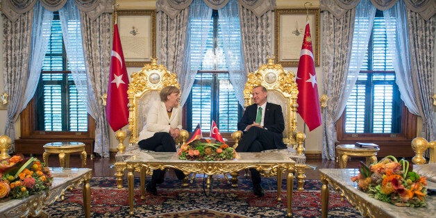 ISTANBUL, TURKEY - OCTOBER 18: In this handout photo provided by the German Government Press Office (BPA), German Chancellor Angela Merkel and Turkish President Recep Tayyip Erdogan talk at the start of their meeting at the Yildiz Palace on October 18, 2015 in Istanbul, Turkey. Merkel also met Turkish Prime Minister Ahmet Davutoglu earlier today. (Photo by Guido Bergmann/Bundesregierung via Getty Images)