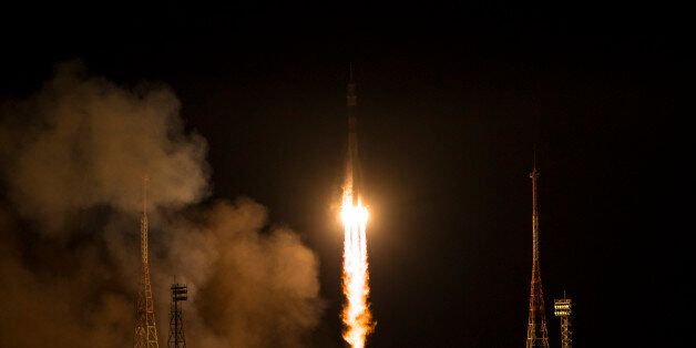 BAIKONUR, KAZAKHSTAN - NOVEMBER 24: In this handout provided by the National Aeronautics and Space Administration (NASA) The Soyuz TMA-15M rocket launches from the Baikonur Cosmodrome November 24, 2014 in Baikonur, Kazakhstan. The Soyuz TMA-15M spacecraft will carry Expedition 42 Soyuz Commander Anton Shkaplerov of the Russian Federal Space Agency (Roscosmos), Flight Engineer Terry Virts of NASA and Flight Engineer Samantha Cristoforetti of the European Space Agency into orbit to begin their five and a half month mission on the International Space Station. (Photo by Aubrey Gemignani/NASA via Getty Images)