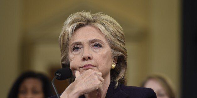 Former Secretary of State and Democratic Presidential hopeful Hillary Clinton testifies before the House Select Committee on Benghazi on Capitol Hill in Washington, DC, October 22, 2015. Clinton took the stand Thursday to defend her role in responding to deadly attacks on the US mission in Libya, as Republicans forged ahead with an inquiry criticized as partisan anti-Clinton propaganda. AFP PHOTO / SAUL LOEB (Photo credit should read SAUL LOEB/AFP/Getty Images)