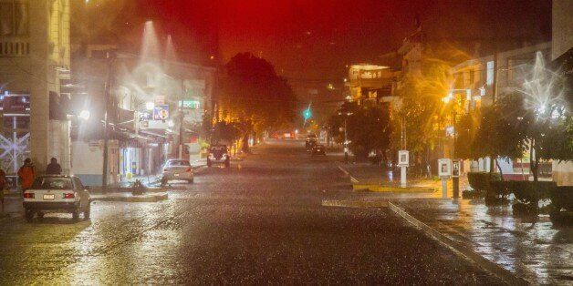 View of the street during the arrival of hurricane Patricia in Puerto Vallarta, Mexico on October 23 ,2015. Monster Hurricane Patricia roared toward Mexico's Pacific coast on Friday, prompting authorities to evacuate villagers, close ports and urge tourists to cancel trips over fears of a catastrophe. The US National Hurricane Center called Patricia the strongest eastern north Pacific hurricane on record. It said the storm will make a potentially catastrophic landfall later Friday in southwestern Mexico. AFP PHOTO/HECTOR GUERRERO (Photo credit should read HECTOR GUERRERO/AFP/Getty Images)