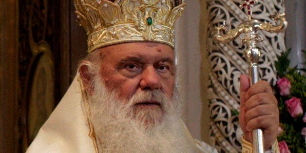 Russian Orthodox Patriarch Kirill I, left, and Archbishop of Athens Ieronimos, lead a Sunday mass at the church of Agios Panteleimonas in Athens, Sunday, June 2, 2013. Patriarch Kirill I is in Greece for a 7-day official visit. (AP Photo/Kostas Tsironis)