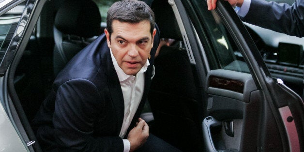 Greece's Prime Minister Alexis Tsipras arrives for an emergency EU heads of state summit on the migrant crisis at the EU Council building in Brussels on Wednesday, Sept. 23, 2015. AP Photo/Francois Walschaerts)