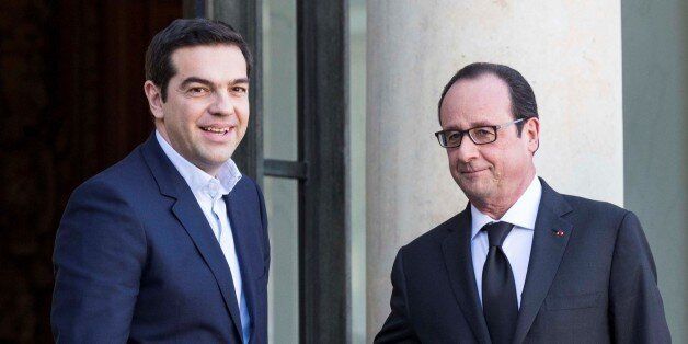 PARIS, FRANCE - FEBRUARY 4: French President Francois Hollande (R) greets Greek Prime Minister Alexis Tsipras (L) upon his arrival at the Elysee Palace, in Paris, France, 04 February 2015. Greek Prime Minister Alexis Tsipras met with EU leader during a week of intense diplomatic efforts by Athens' new government to renegotiate the terms of its international bailout. (Photo by Geoffroy Van der Hasselt/Anadolu Agency/Getty Images)