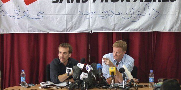 KABUL, AFGHANISTAN - OCTOBER 8: General Director of Doctors Without Borders, or MÃ©decins Sans FrontiÃ¨res (MSF), Christopher Stokes (R) and Country Representative, Guilhem Molinie (L) hold a press conference over the airstrike on Kunduz hospital, at the MSF office in Kabul on October 8, 2015. (Photo by Mustafa Bag/Anadolu Agency/Getty Images)