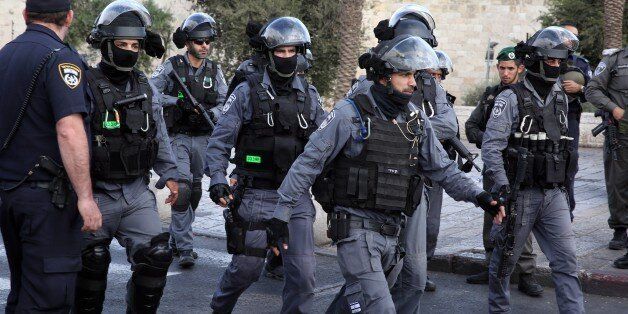 Israeli border guards secure the site after a Palestinian stabbed two police officers before being shot dead on October 10, 2015 outside the Old City in east Jerusalem, in the second such attack in the same area. The attack took place by the Damascus Gate, metres (yards) away from where a Palestinian teen stabbed two Jews before being shot dead by police earlier in the day. AFP PHOTO / GALI TIBBON (Photo credit should read GALI TIBBON/AFP/Getty Images)