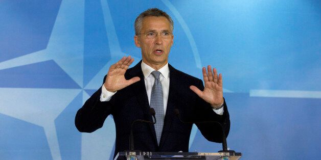 NATO Secretary General Jens Stoltenberg speaks during a media conference at NATO headquarters in Brussels on Thursday, Oct. 8, 2015. NATO defense ministers meet Thursday to consider the implications of recent Russian military actions in Syria, as well as ongoing measures to retool NATO to meet contemporary security threats. (AP Photo/Virginia Mayo)