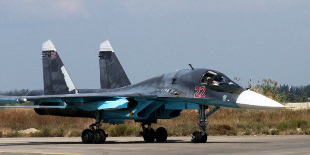 In this photo taken from Russian Defense Ministry official website on Tuesday, Oct. 6, 2015, a Russian SU-34 bomber taxies at an air base Hmeimim in Syria. A spokeswoman for the Russian foreign ministry has rejected claims that Russia in its airstrikes in Syria is targeting civilians or opposition forces. (AP Photo/ Russian Defense Ministry Press Service)