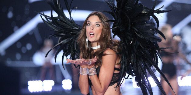 Model Alessandra Ambrosio displays a creation at the Victoria's Secret fashion show in London, Tuesday, Dec. 2, 2014. (Photo by Joel Ryan/Invision/AP)