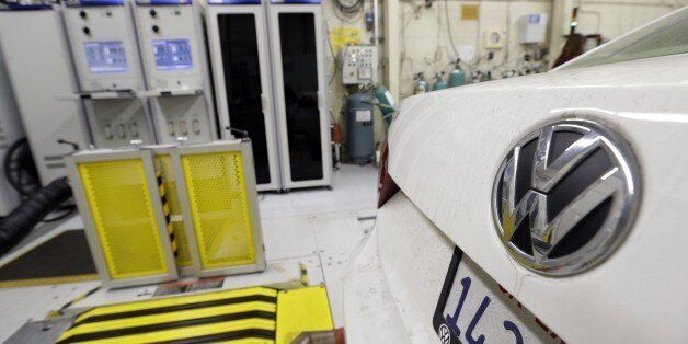 In this Sept. 30, 2015 photo, a 2013 Volkswagen Passat with a diesel engine is evaluated at the California Air Resources Board emissions test lab in El Monte, Calif. Three years after Volkswagen opened a pollution testing center in Oxnard, Calif., VW admitted that it manipulated emissions results in 482,000 U.S. diesel vehicles to make them appear to run cleaner, raising questions around Volkswagenâs only test center in North America. (AP Photo/Nick Ut)