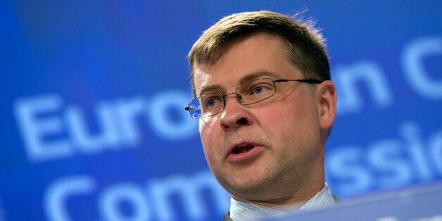 European Commission Vice-President Valdis Dombrovskis speaks during a media conference at EU headquarters in Brussels on Wednesday, July 1, 2015. The eurozone's finance ministers are set to weigh a last-minute Greek proposal for a new aid program, submitted Tuesday afternoon, in a conference call which will take place on Wednesday. (AP Photo/Virginia Mayo)