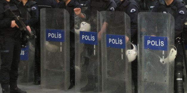 Riot police next to a rally on Iskitlal for people who have been illegally detained by the police.