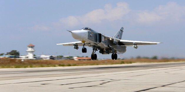 In this photo taken on Saturday, Oct. 3, 2015, Russian SU-24M jet fighter armed with laser guided bombs takes off from a runaway at Hmeimim airbase in Syria. The skies over Syria are increasingly crowded, and increasingly dangerous. The air forces of multiple countries are on the attack, often at cross purposes in Syriaâs civil war, sometimes without coordination and now, it seems, at risk of unintended conflict. The latest entry in the air war is Russia. It says it is bombing the Islamic State in line with U.S. priorities, but the U.S. says Russia is mainly striking anti-government rebels in support of its ally, President Bashar Assad. The Russians, who are not coordinating with the Americans, reportedly also have hit U.S.-supported rebel groups. (AP Photo/Alexander Kots, Komsomolskaya Pravda, Photo via AP)