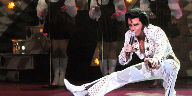 PARIS, FRANCE: Canadian actor and singer Martin Fontaine performs as US singer Elvis Presley 06 November 2003 in Paris during the run-through of the Elvis Story show produced by the Capitole de Quebec theater. The show will run until 02 January 2004 at the Mogador theatre. AFP PHOTO FREDERICK FLORIN (Photo credit should read FREDERICK FLORIN/AFP/Getty Images)