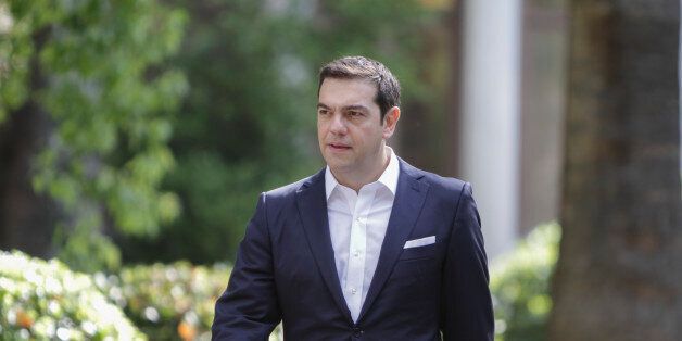 PRESIDENTIAL MANSION, ATHENS, ATTICA, GREECE - 2015/09/23: Alexis Tsipras, the Prime Minister of Greece, leaves the Presidential Mansion after the swearing-in ceremony. The new cabinet ministers under the new Greek Prime Minister Alexis Tsipras got sworn into their offices in the Presidential Mansion, three days after the victory of SYRIZA (Coalition of the Radical Left) in the second Greek General Election in eight months. (Photo by Michael Debets/Pacific Press/LightRocket via Getty Images)