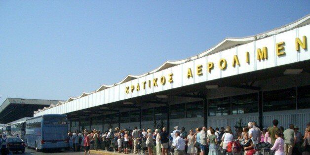 Aaaaaagh! Hyuge queue in 40 degree heat outside the (full) airport terminal building in Corfu. NOT fun.