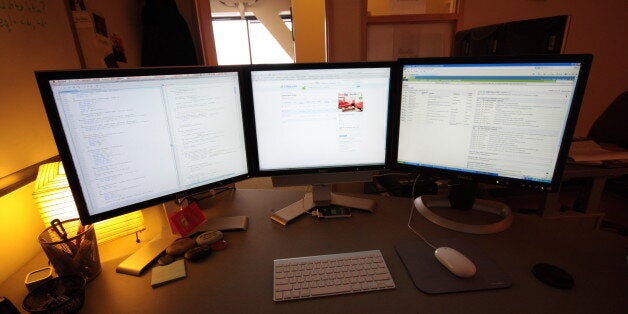 Newish desk setup, I've been in it for almost two months and am really liking it. I'm not by a window which is weak, but i can see across a public space to the windows. Loving the three monitor setup with the left two on my mac pro and right one on a little PC. Keyboard is shared with synergy. I have white boards on the left and behind me.